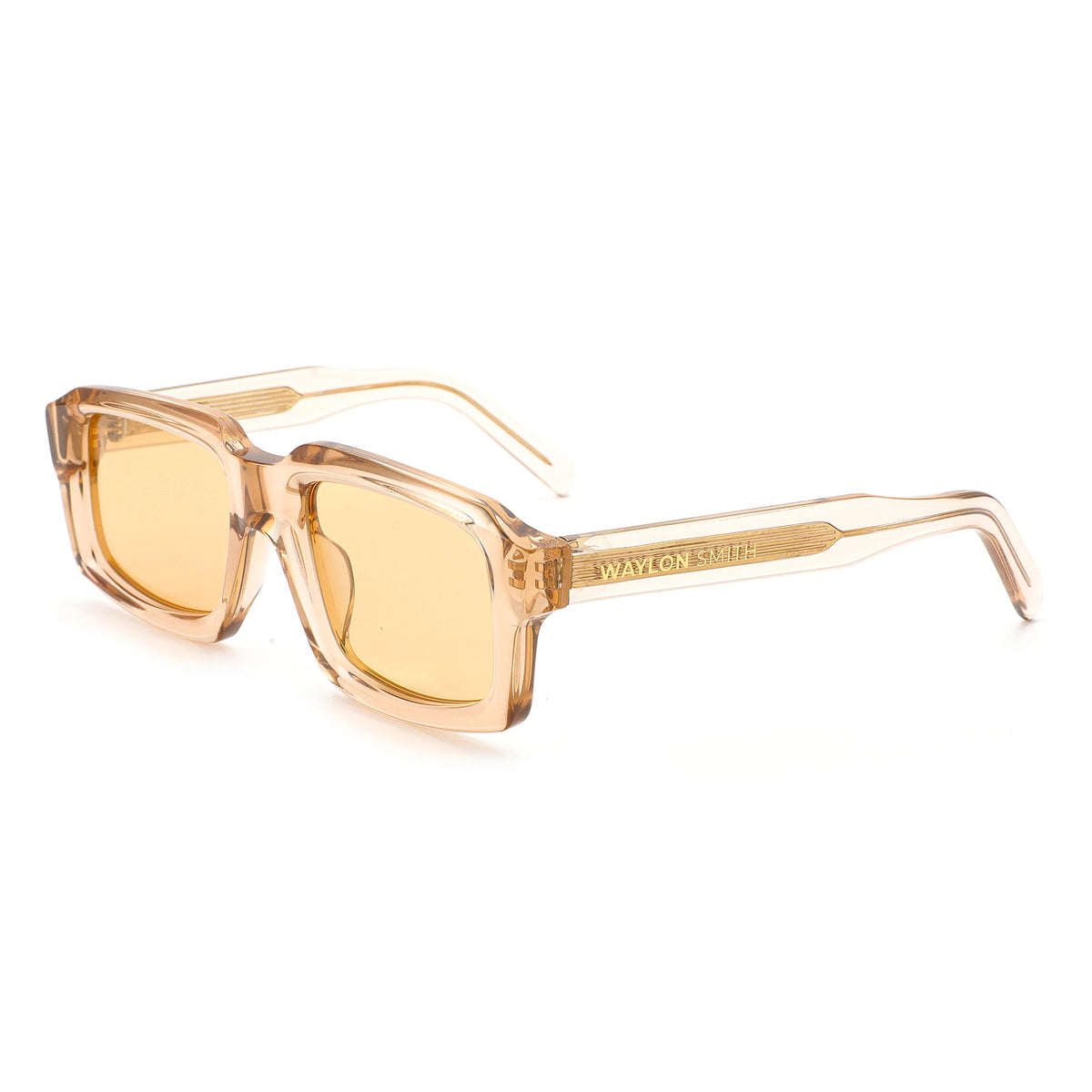 Side view of Waylon Smith Syndicate sunglasses in Translucent Amber, transparent honey-colored acetate frame, showing the Waylon Smith wordmark on the temple