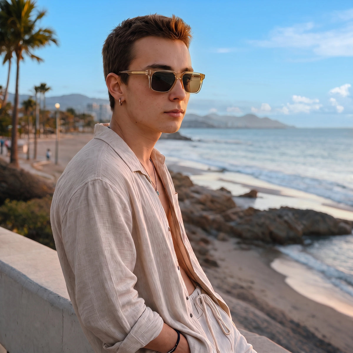 Man on a boardwalk wearing Waylon Smith The Vinewood sunglasses in Champagne Gold